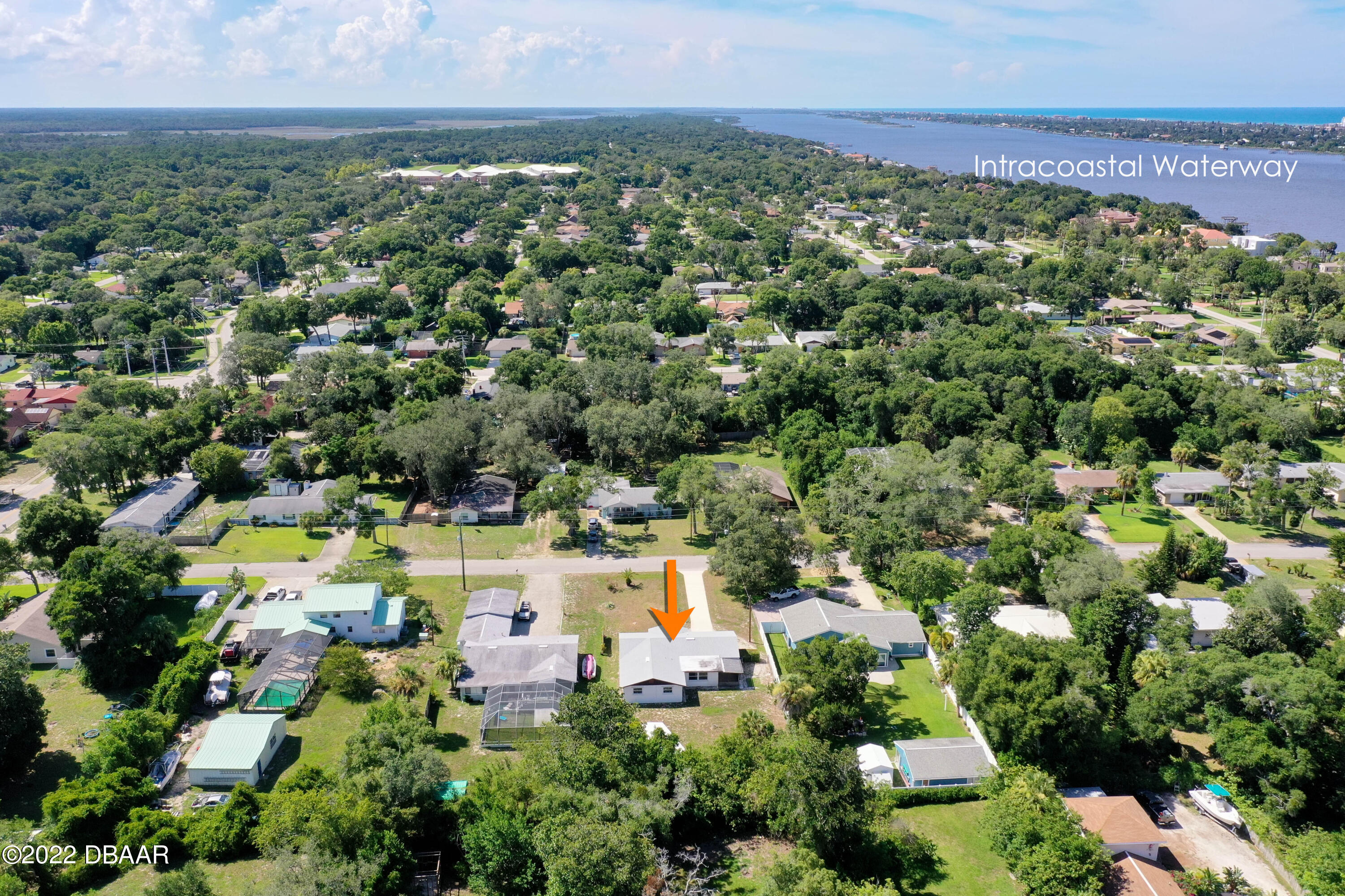 64 Cumberland Avenue Ormond Beach, FL 32174 - Photo 37 of 38 an aerial view of a houses with a yard