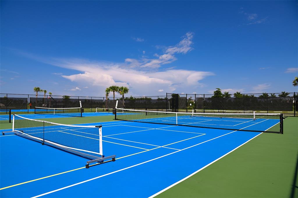 10770 Eclipse Street Sarasota, FL 34241 - Photo 48 of 48 a view of an outdoor space and tennis court
