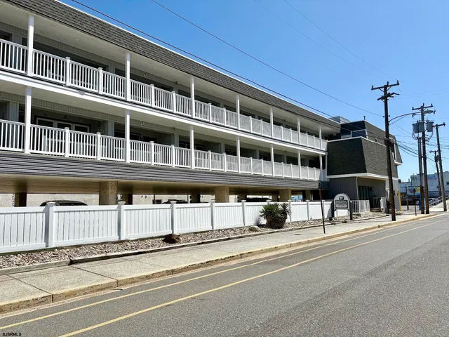 a view of a building with a street