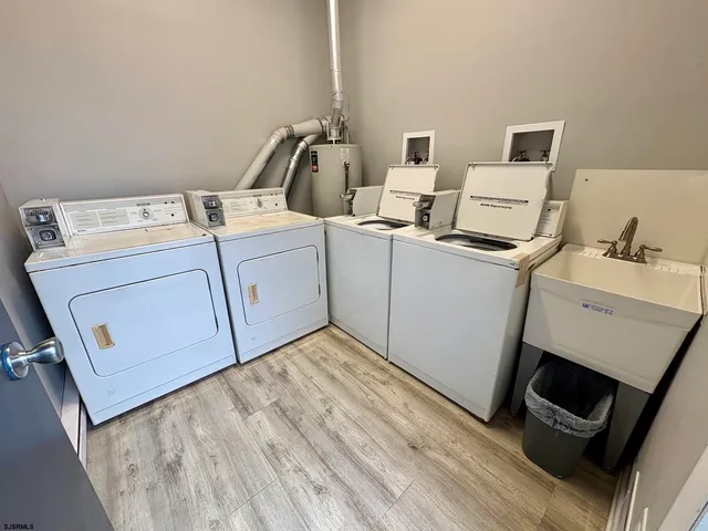 a view of a swimming pool with a lounge chairs