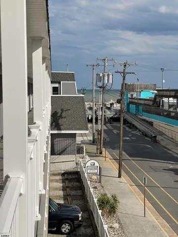 a view of swimming pool with a yard