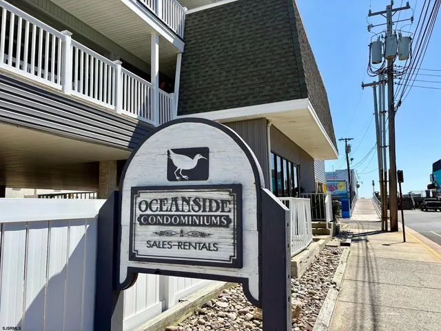 a view of a street with a building