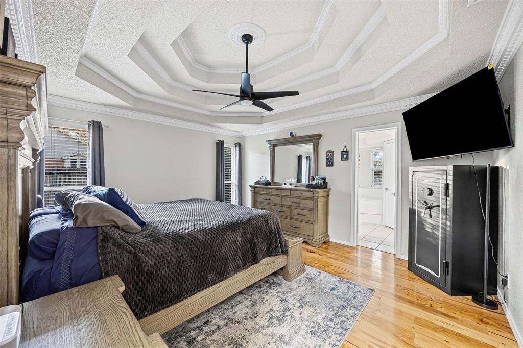 112 Saddle Hills Road Burleson, TX 76028 - Photo 20 of 38 a living room with furniture and a flat screen tv