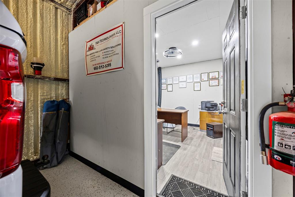 112 Saddle Hills Road Burleson, TX 76028 - Photo 32 of 38 a view of a hallway with seating area