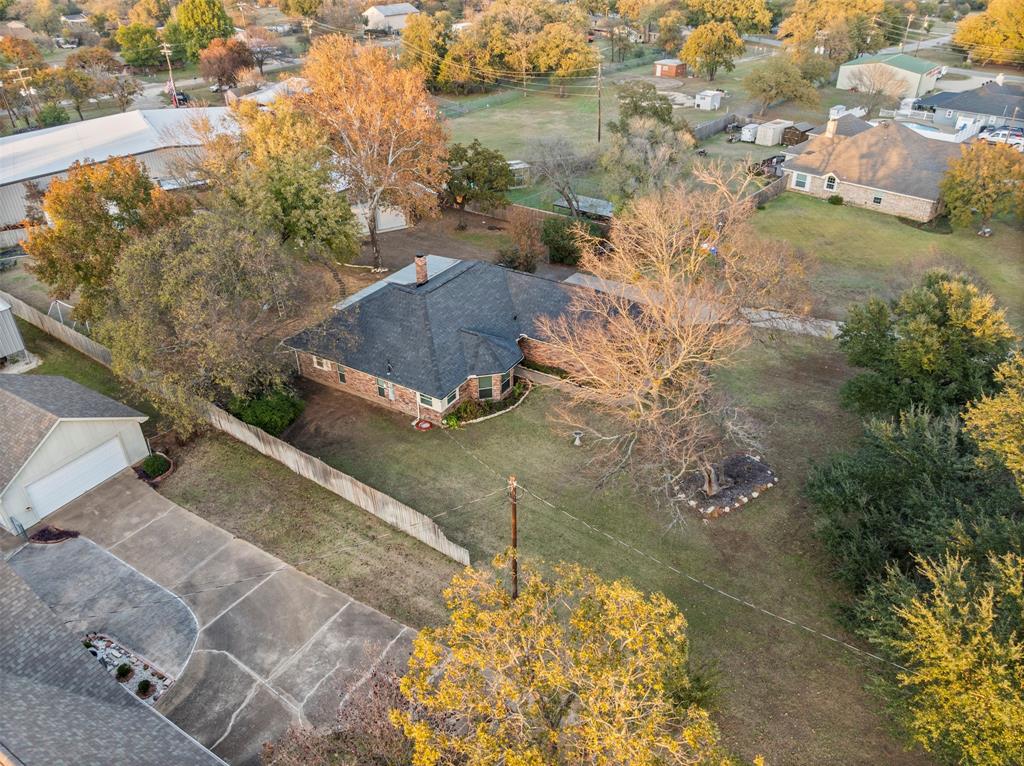 112 Saddle Hills Road Burleson, TX 76028 - Photo 34 of 38 an aerial view of a house with a yard