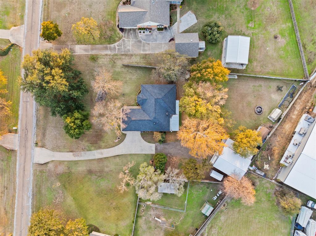 112 Saddle Hills Road Burleson, TX 76028 - Photo 37 of 38 an aerial view of a house with a yard