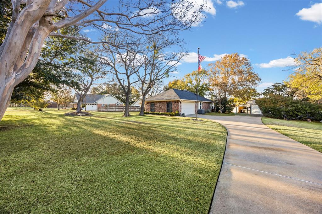 112 Saddle Hills Road Burleson, TX 76028 - Photo 7 of 38 a view of street with large trees