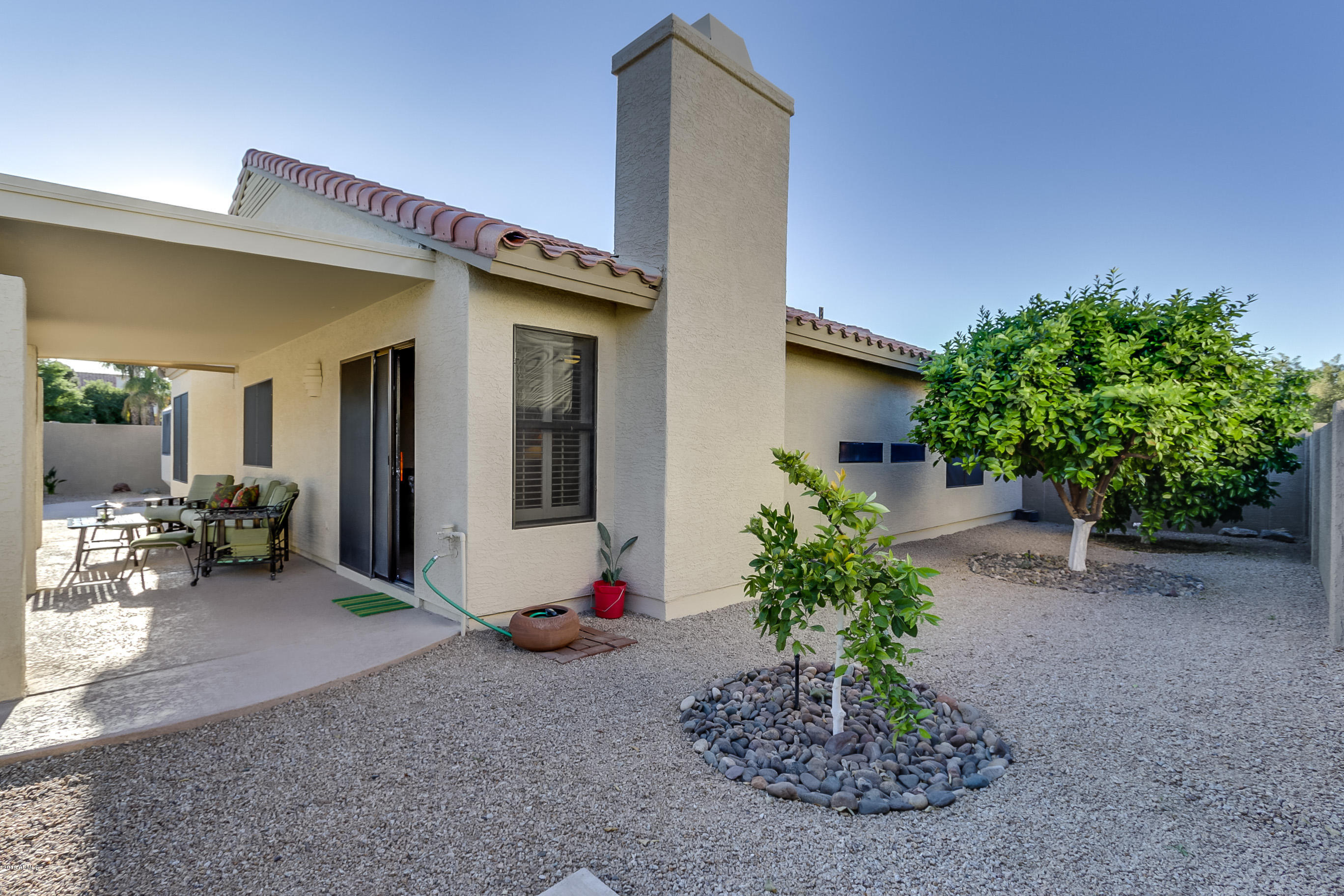 3509 East Desert Trumpet Road Phoenix, AZ 85044 - Photo 33 of 37 Patio and Large Citrus on Side Yard