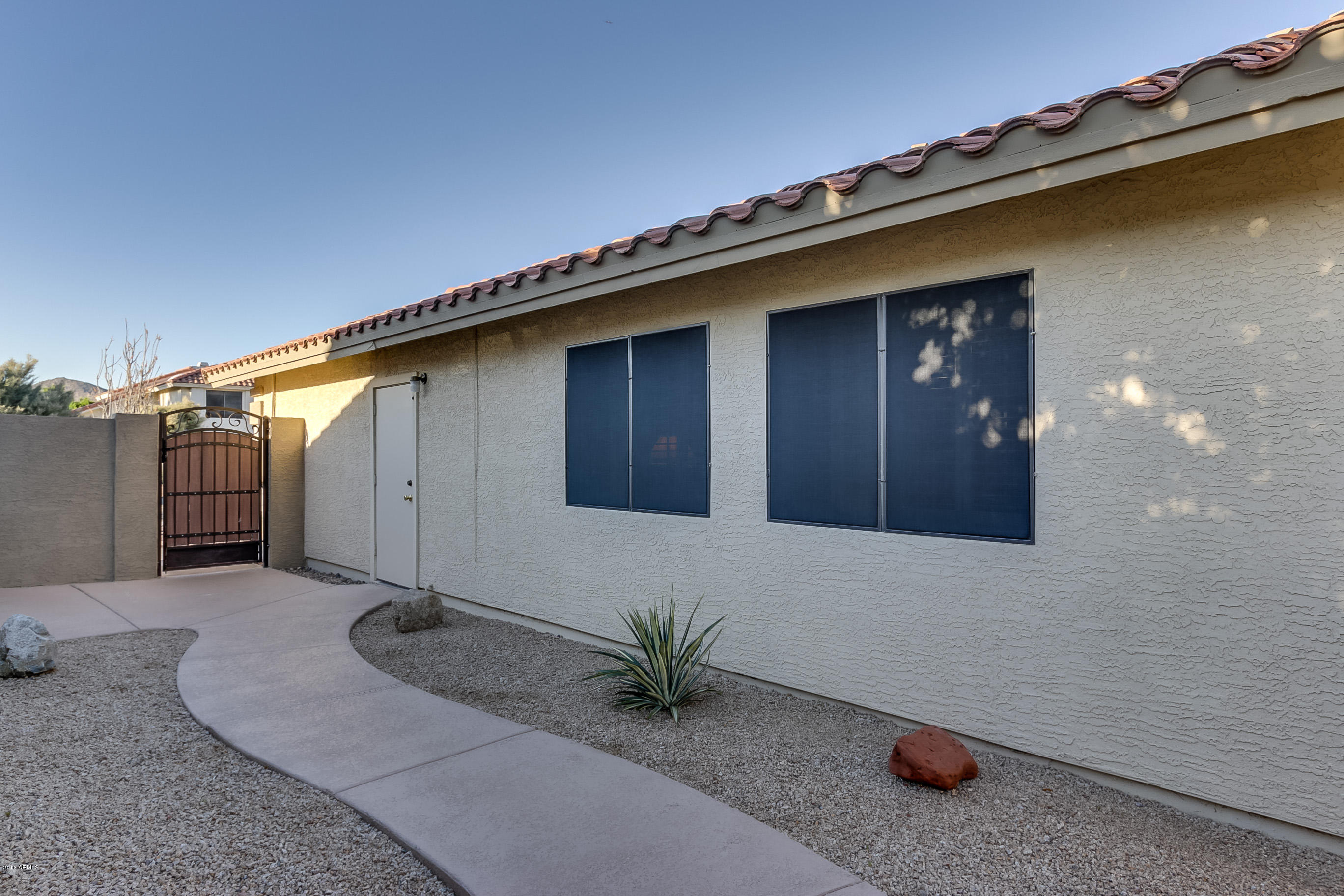 3509 East Desert Trumpet Road Phoenix, AZ 85044 - Photo 36 of 37 Side Yard with Newer Gates