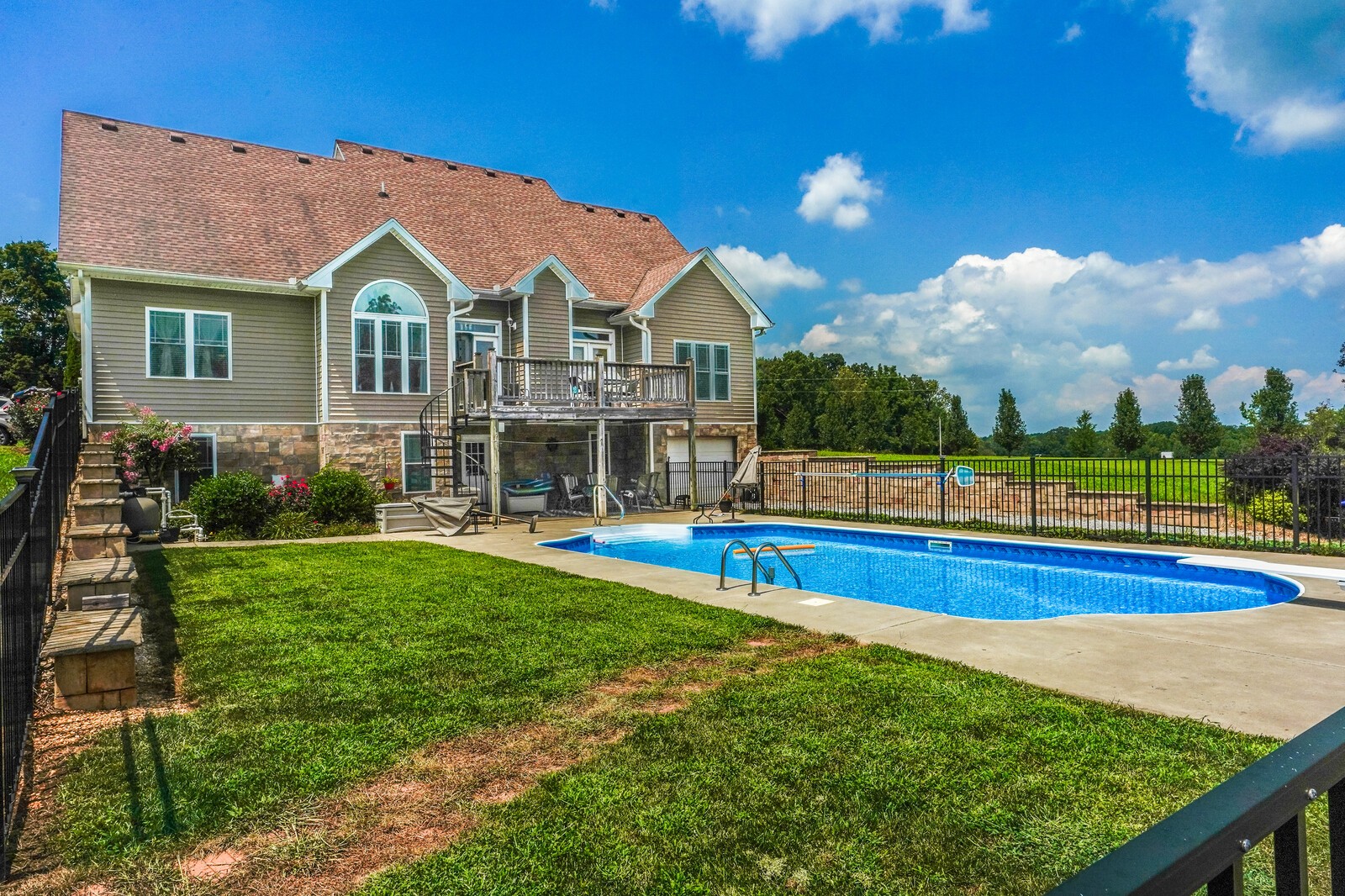 4361 Oregon Road Springfield, TN 37172 - Photo 2 of 40 a view of an house with swimming pool and yard