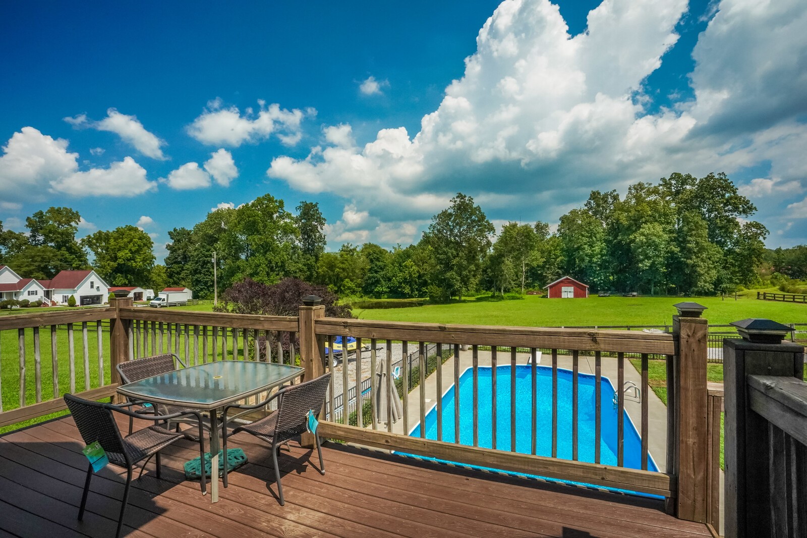 4361 Oregon Road Springfield, TN 37172 - Photo 8 of 40 a view of a roof deck with two chairs and a table