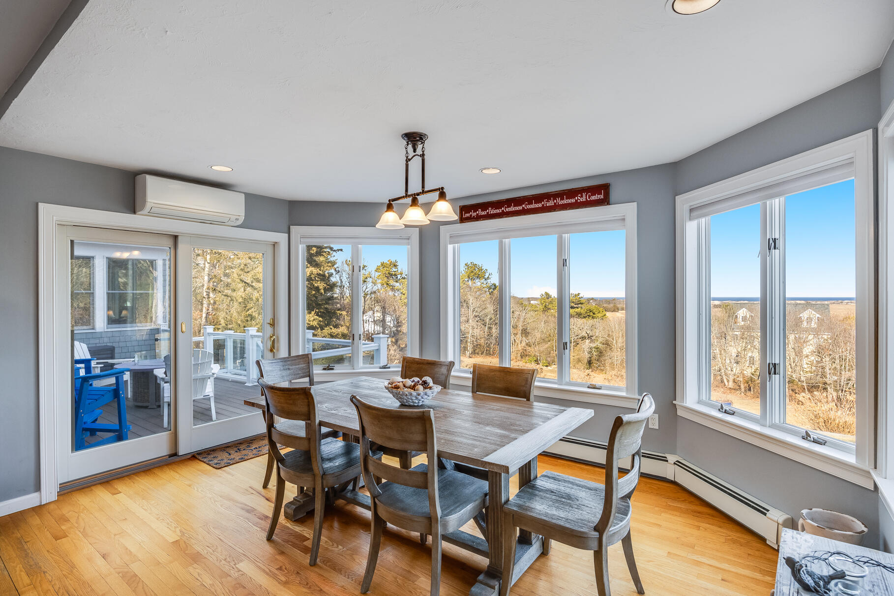 58 Williams Path West Barnstable, MA 02668 - Photo 26 of 74 a dining room with furniture a chandelier and wooden floor