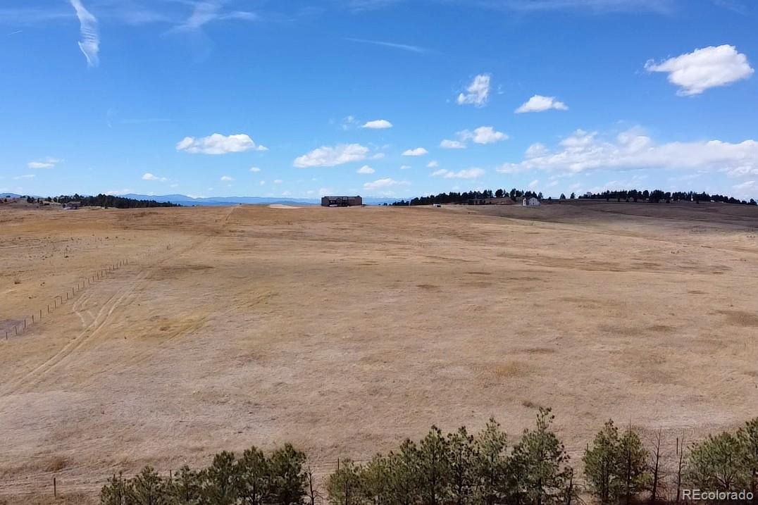 35501 Cheyenne Trail Elizabeth, CO 80107 - Photo 14 of 17 a view of lake and mountain