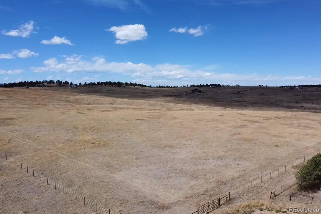 35501 Cheyenne Trail Elizabeth, CO 80107 - Photo 15 of 17 a view of lake with mountain