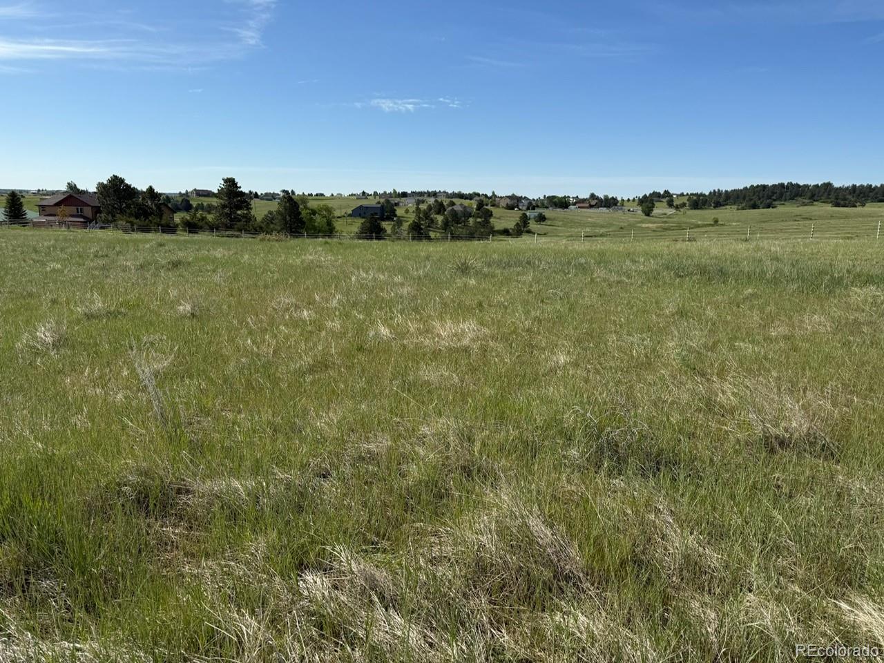 35501 Cheyenne Trail Elizabeth, CO 80107 - Photo 9 of 17 a view of lake and mountain with trees
