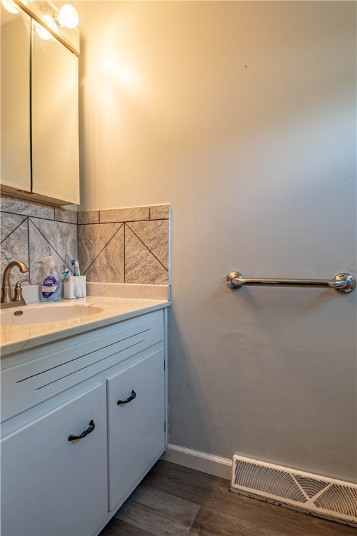 1823 Cooper Drive Decatur, IL 62526 - Photo 14 of 21 a bathroom with a sink and vanity