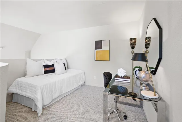 a bathroom with a sink vanity and mirror