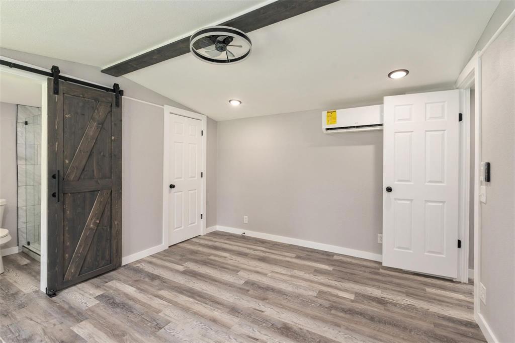 19930 Leisure Land Road Payne Springs, TX 75156 - Photo 13 of 21 a view of a hallway with a refrigerator