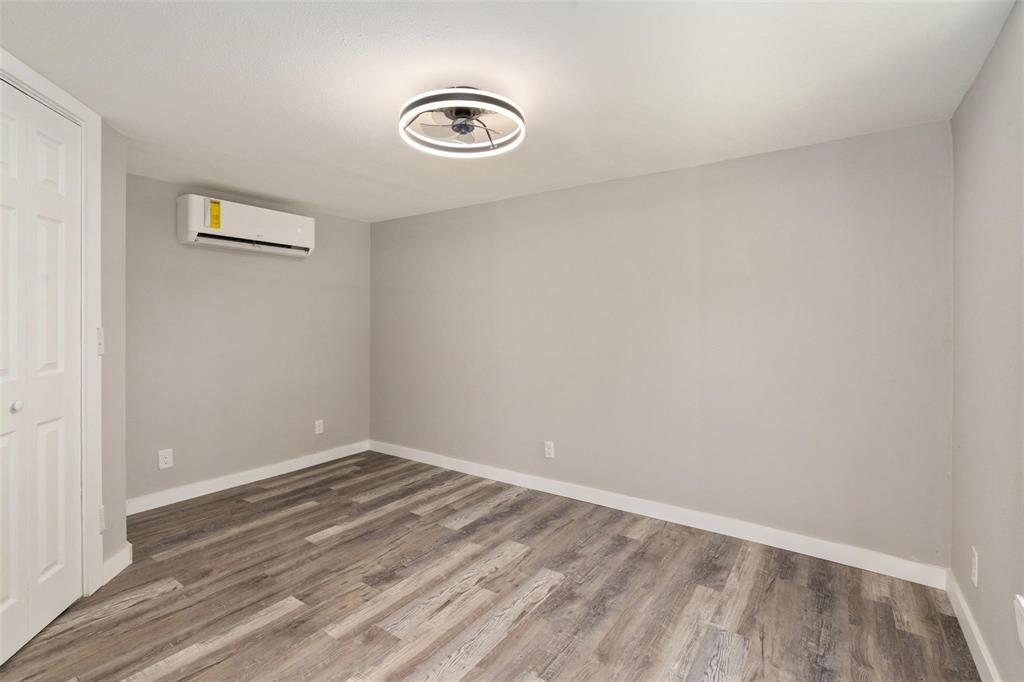 19930 Leisure Land Road Payne Springs, TX 75156 - Photo 16 of 21 a view of a room with wooden floor