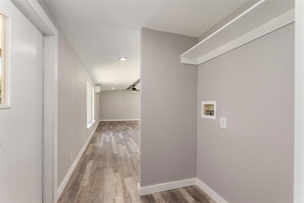 19930 Leisure Land Road Payne Springs, TX 75156 - Photo 18 of 21 a view of a hallway with wooden floor
