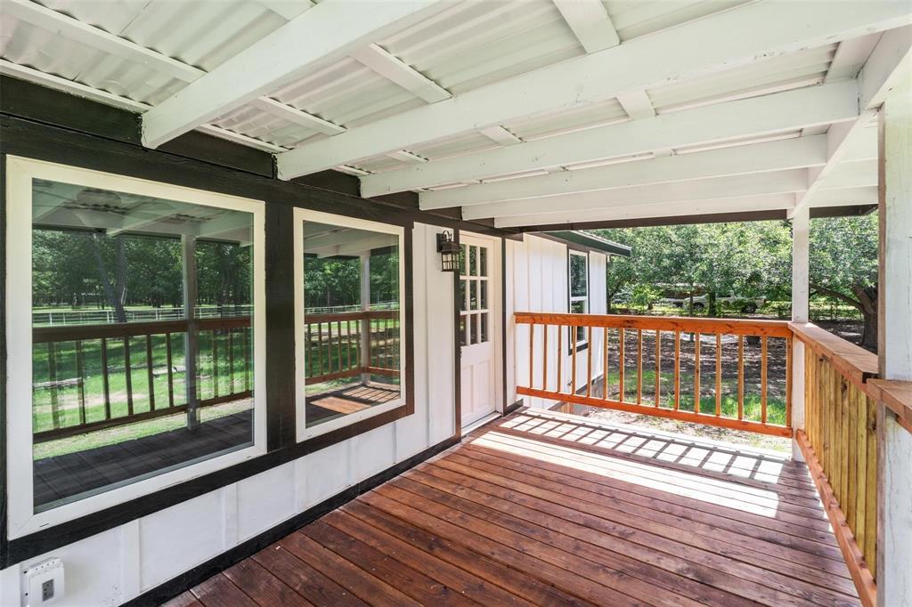 19930 Leisure Land Road Payne Springs, TX 75156 - Photo 2 of 21 a view of a porch with wooden floor