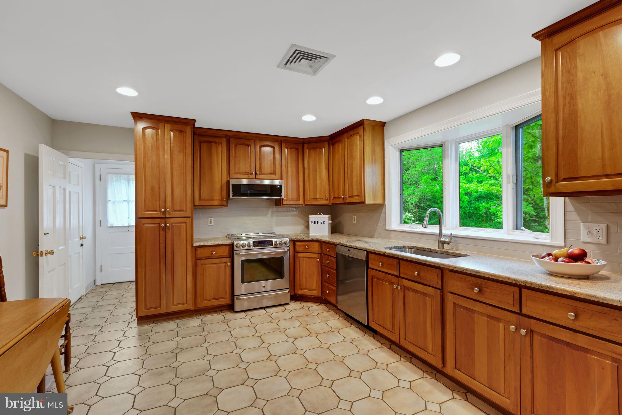 501 Oakbourne Road West Chester, PA 19382 - Photo 17 of 44 Kitchen w/ Cherry Cabinets & Granite Counters