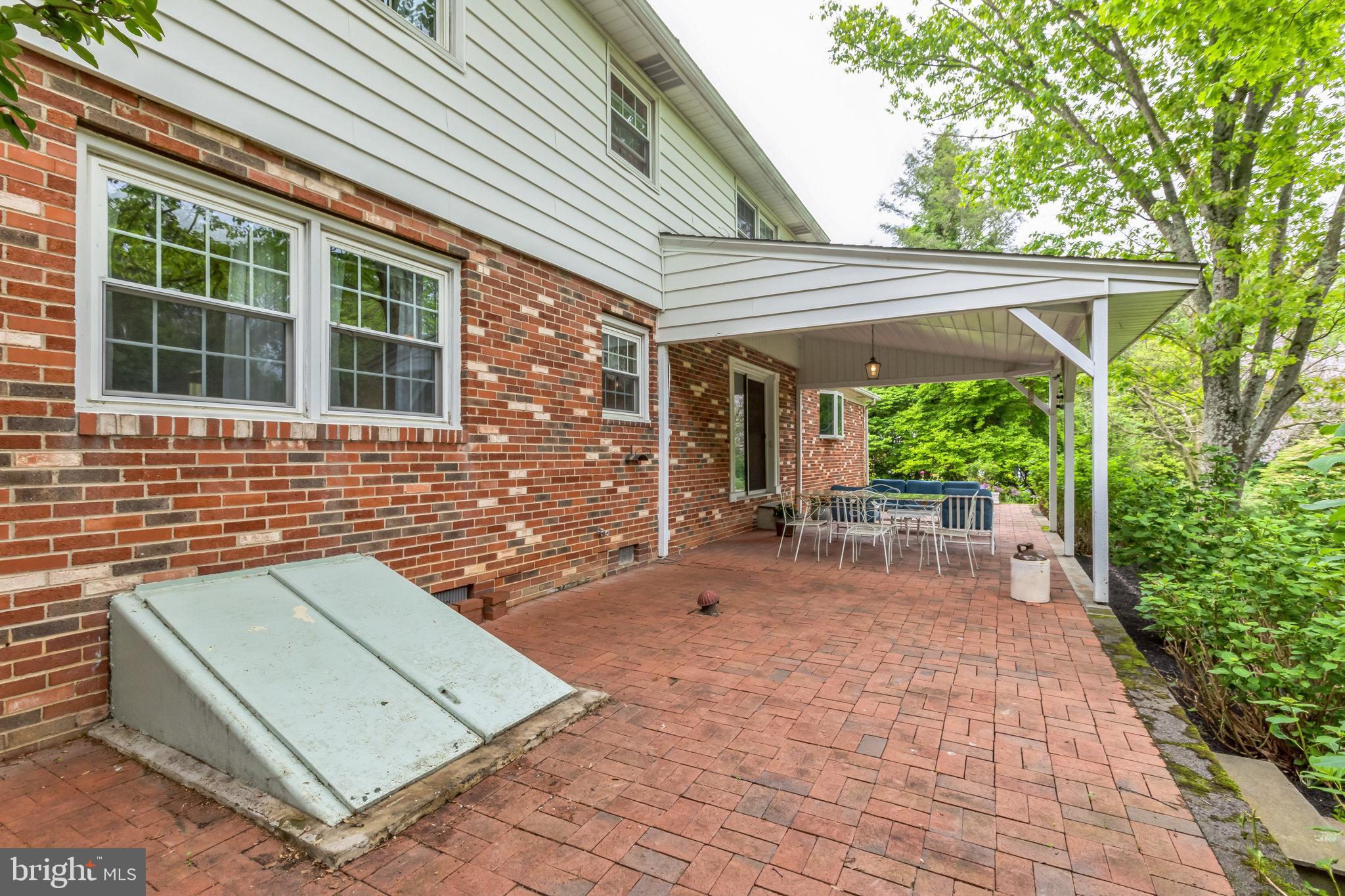 501 Oakbourne Road West Chester, PA 19382 - Photo 39 of 44 Patio runs the length of house
