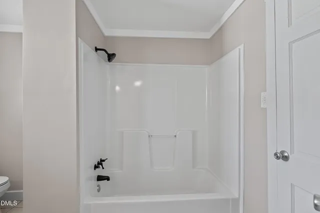 a view of an empty room with window