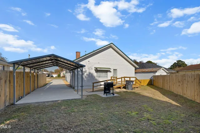a view of a outdoor space with porch and wooden floor