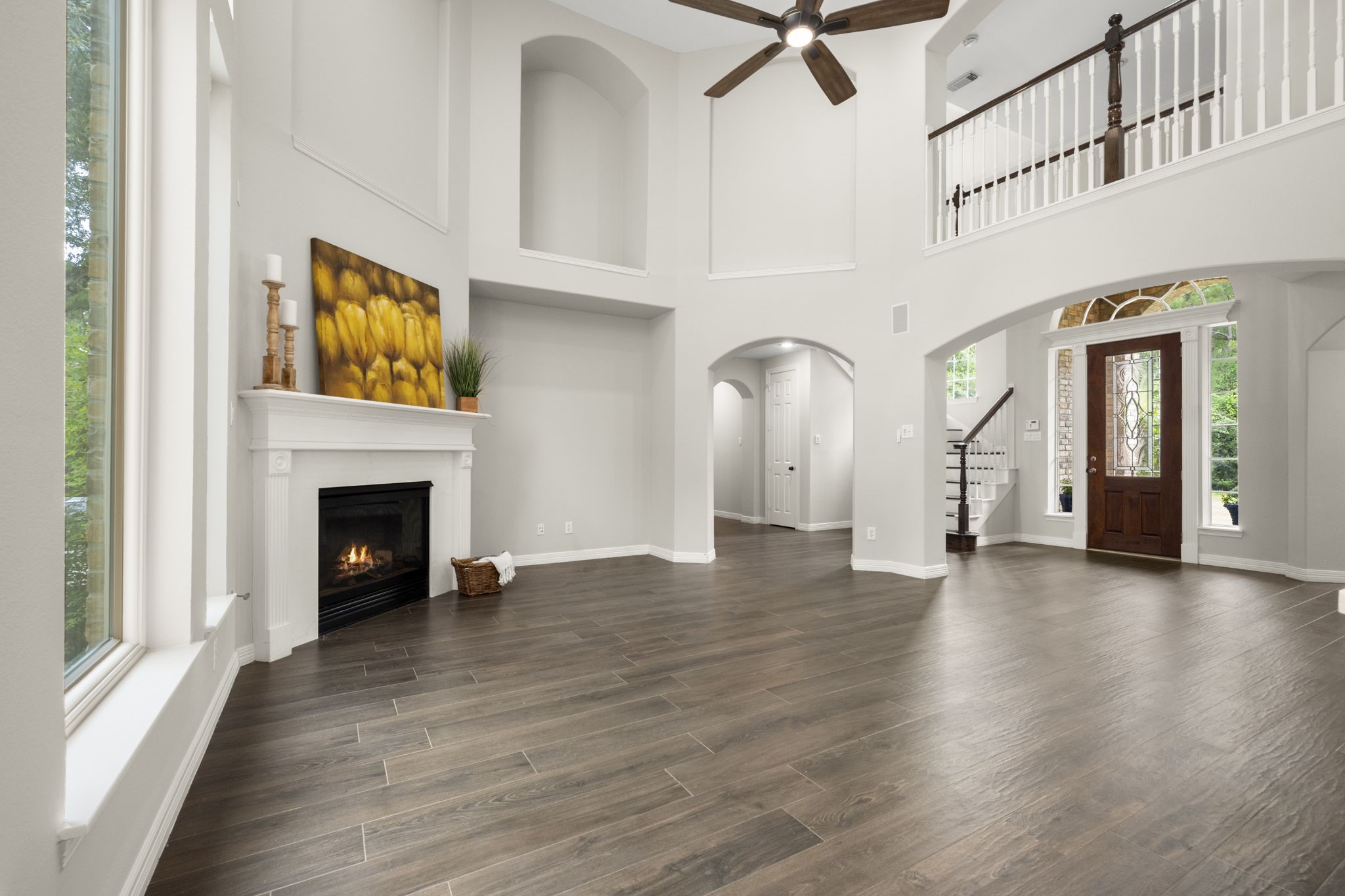 2326 Timbergreen Circle Magnolia, TX 77355 - Photo 15 of 43 a view of an empty room with exposed radiator and fireplace