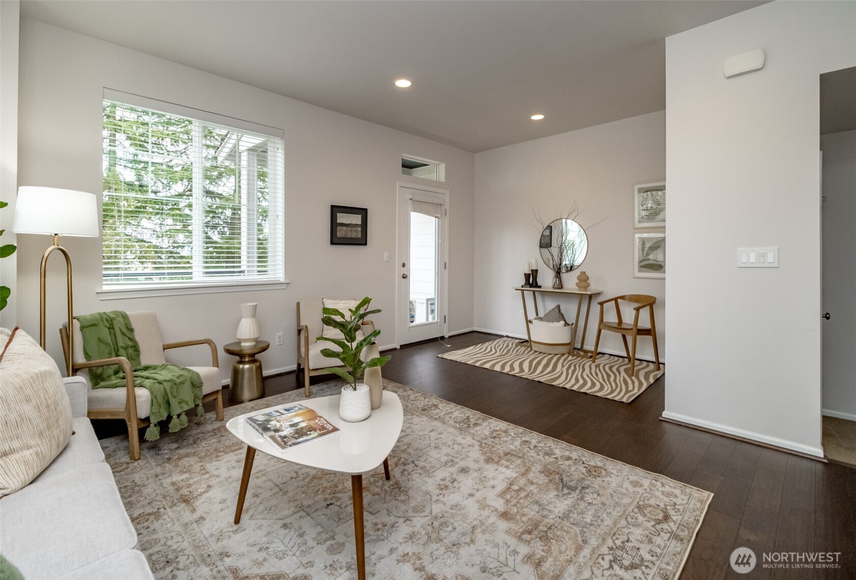 6830 31st Avenue Southwest Seattle, WA 98126 - Photo 13 of 28 a living room with furniture and a window