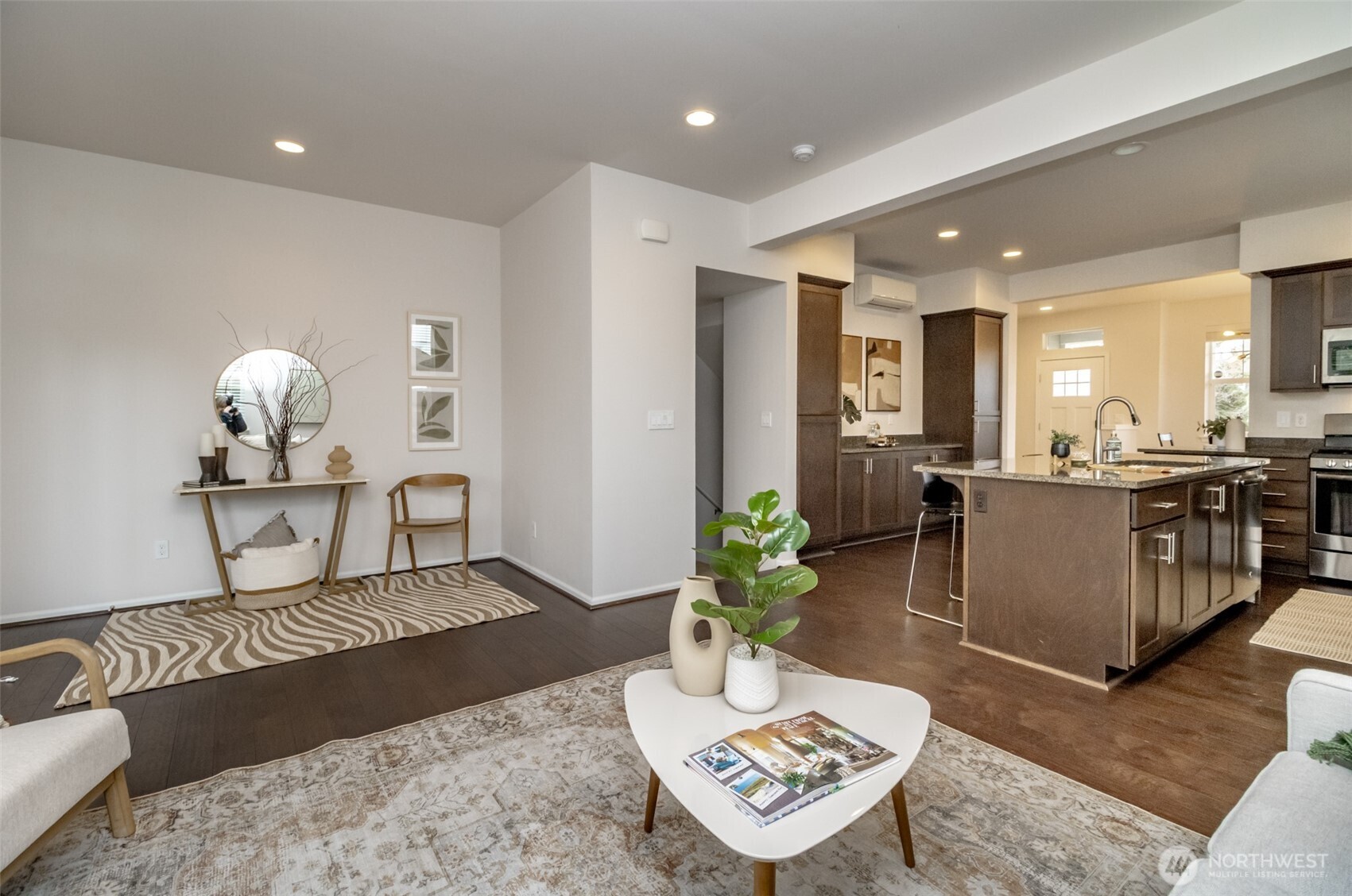 6830 31st Avenue Southwest Seattle, WA 98126 - Photo 14 of 28 a living room with furniture and a dining table