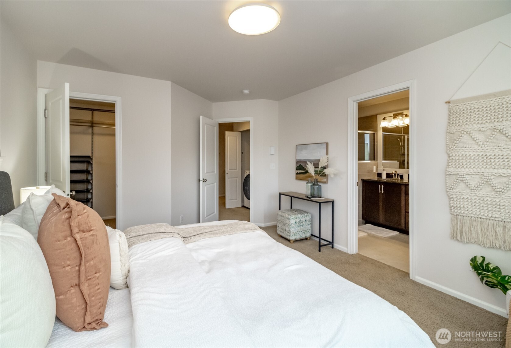 6830 31st Avenue Southwest Seattle, WA 98126 - Photo 16 of 28 a bedroom with a bed and a large mirror