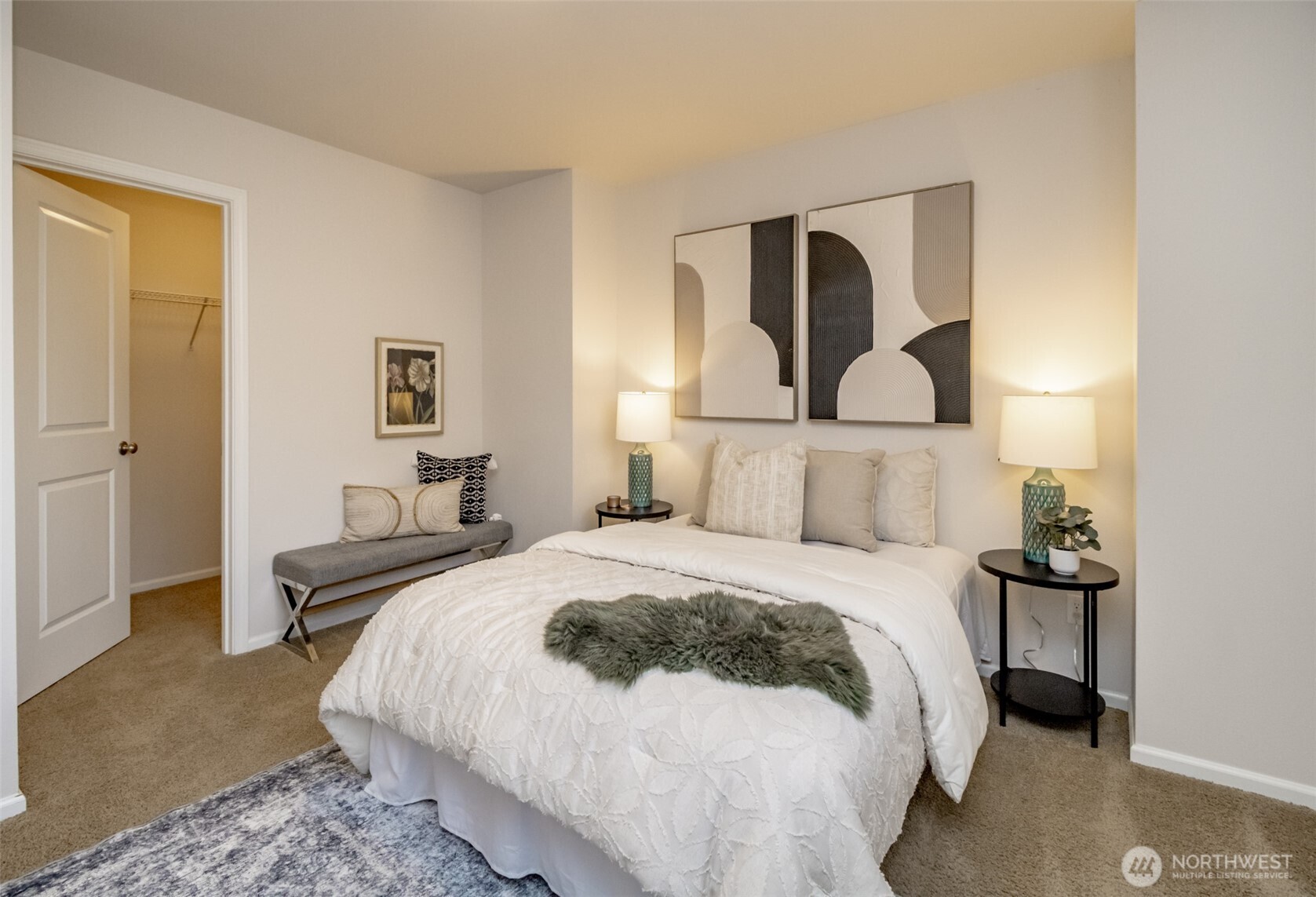 6830 31st Avenue Southwest Seattle, WA 98126 - Photo 25 of 28 a bedroom with a bed and a painting