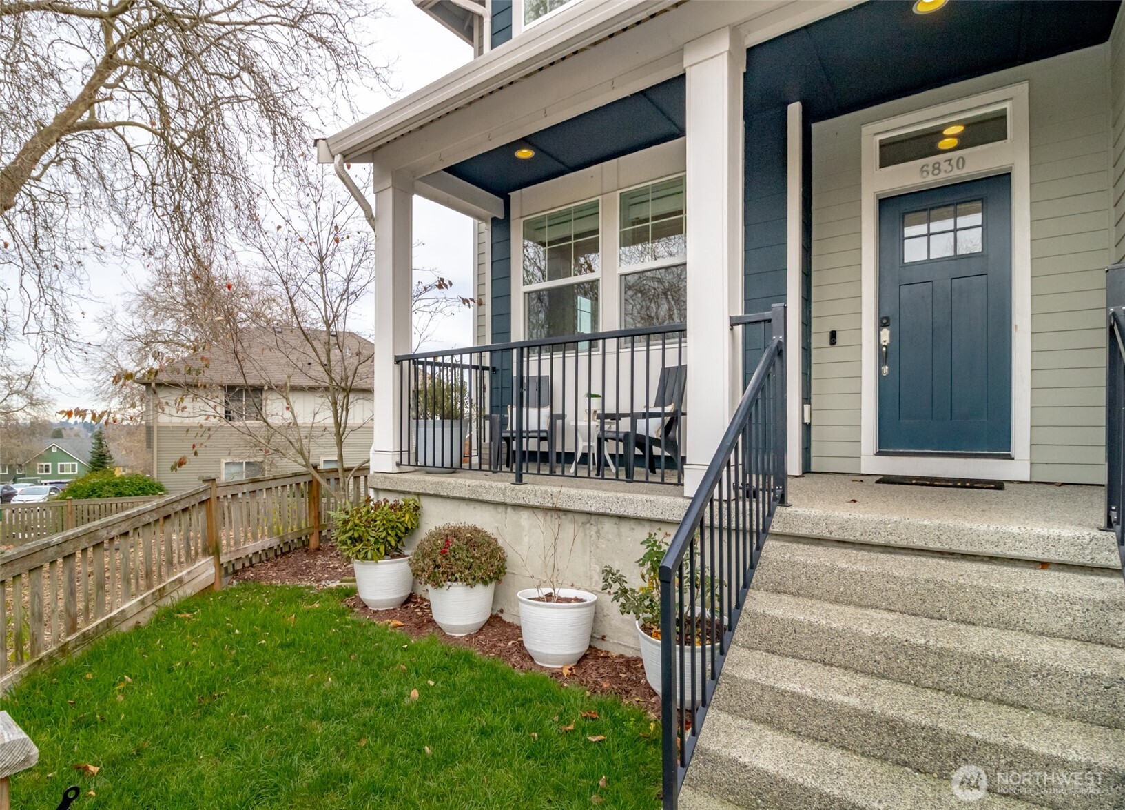 6830 31st Avenue Southwest Seattle, WA 98126 - Photo 3 of 28 a view of a house with backyard and sitting area