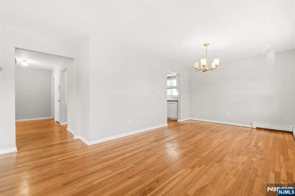 24 East Ruby Avenue, Unit 2 Palisades Park, NJ 07650 - Photo 7 of 19 a view of empty room with wooden floor