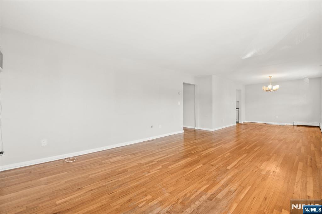 24 East Ruby Avenue, Unit 2 Palisades Park, NJ 07650 - Photo 9 of 19 a view of empty room with wooden floor