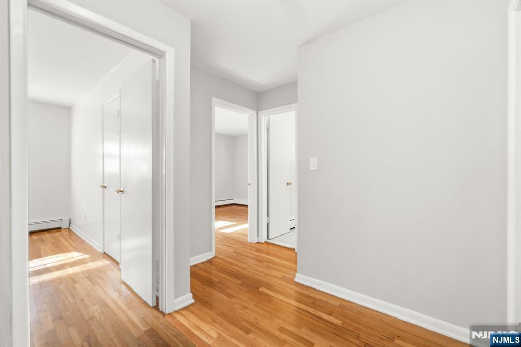 24 East Ruby Avenue, Unit 2 Palisades Park, NJ 07650 - Photo 10 of 19 a view of a room with wooden floor