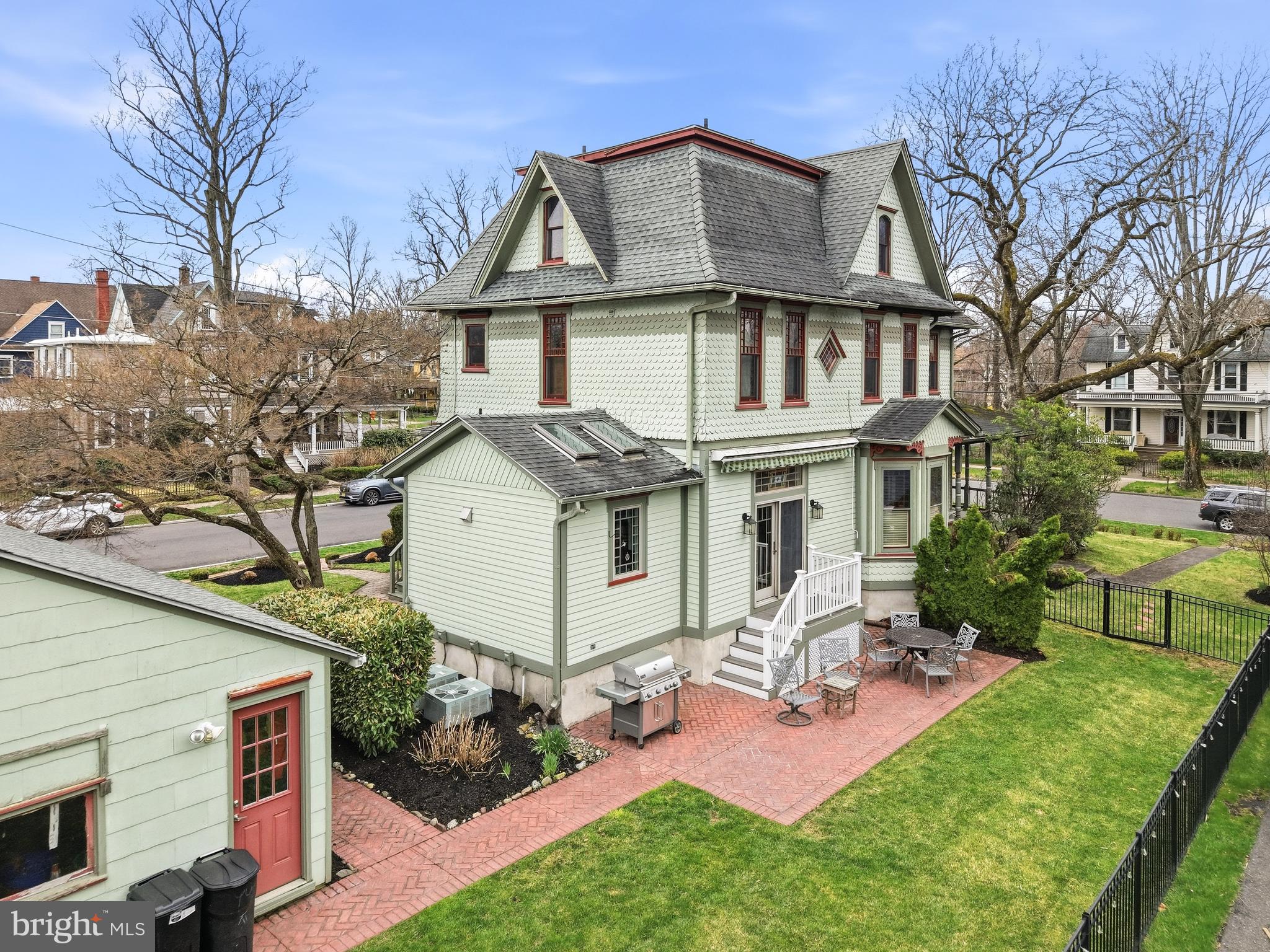 323 Washington Avenue Haddonfield, NJ 08033 - Photo 14 of 57 a front view of a house with garden