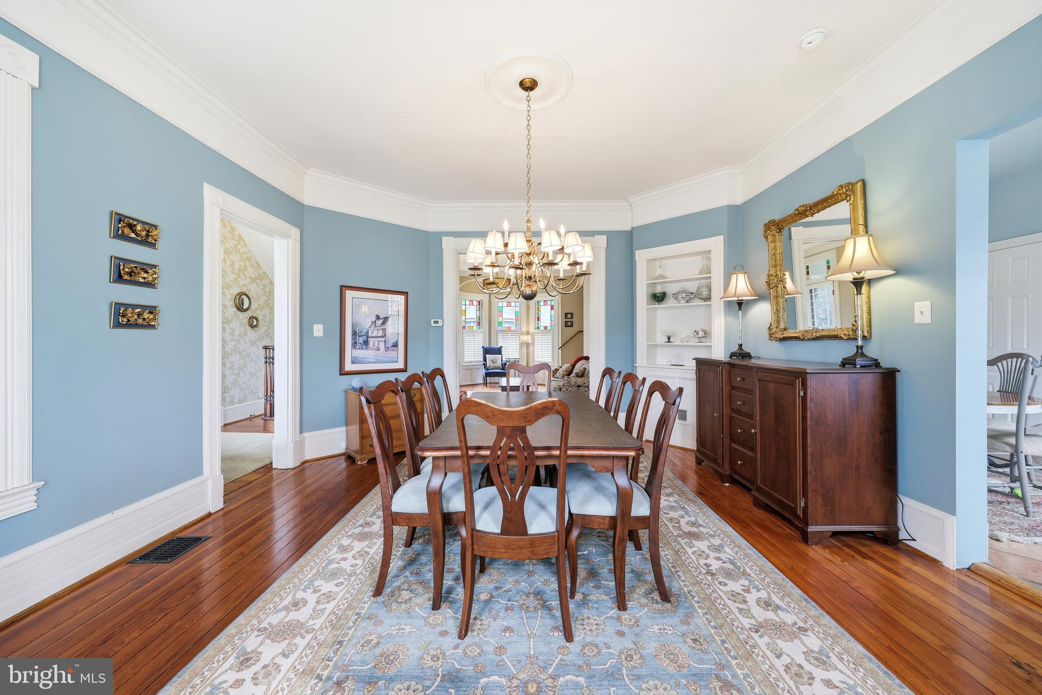 323 Washington Avenue Haddonfield, NJ 08033 - Photo 23 of 57 a dining room with furniture a chandelier and wooden floor