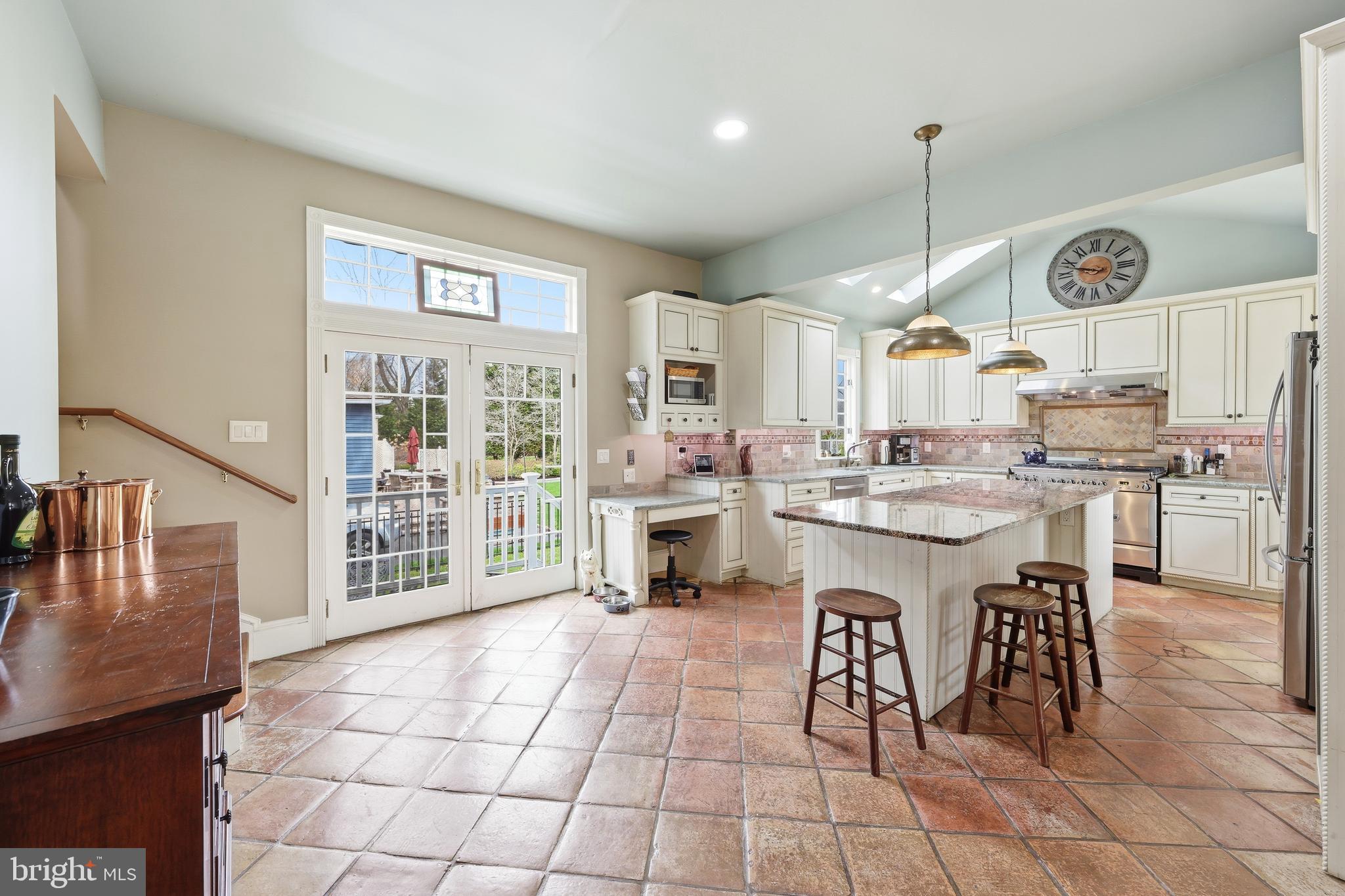 323 Washington Avenue Haddonfield, NJ 08033 - Photo 28 of 57 a kitchen with granite countertop a sink cabinets and stainless steel appliances