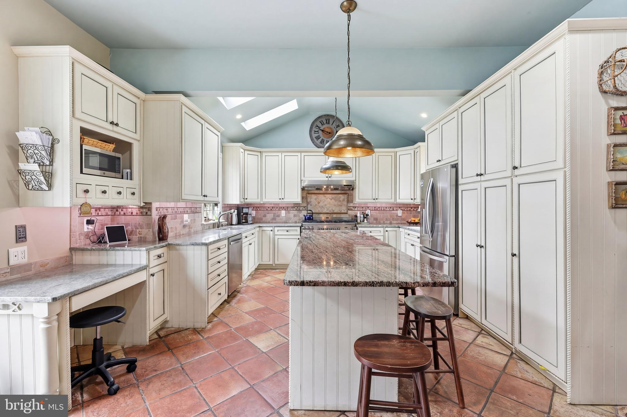 323 Washington Avenue Haddonfield, NJ 08033 - Photo 29 of 57 a kitchen with cabinets and chairs