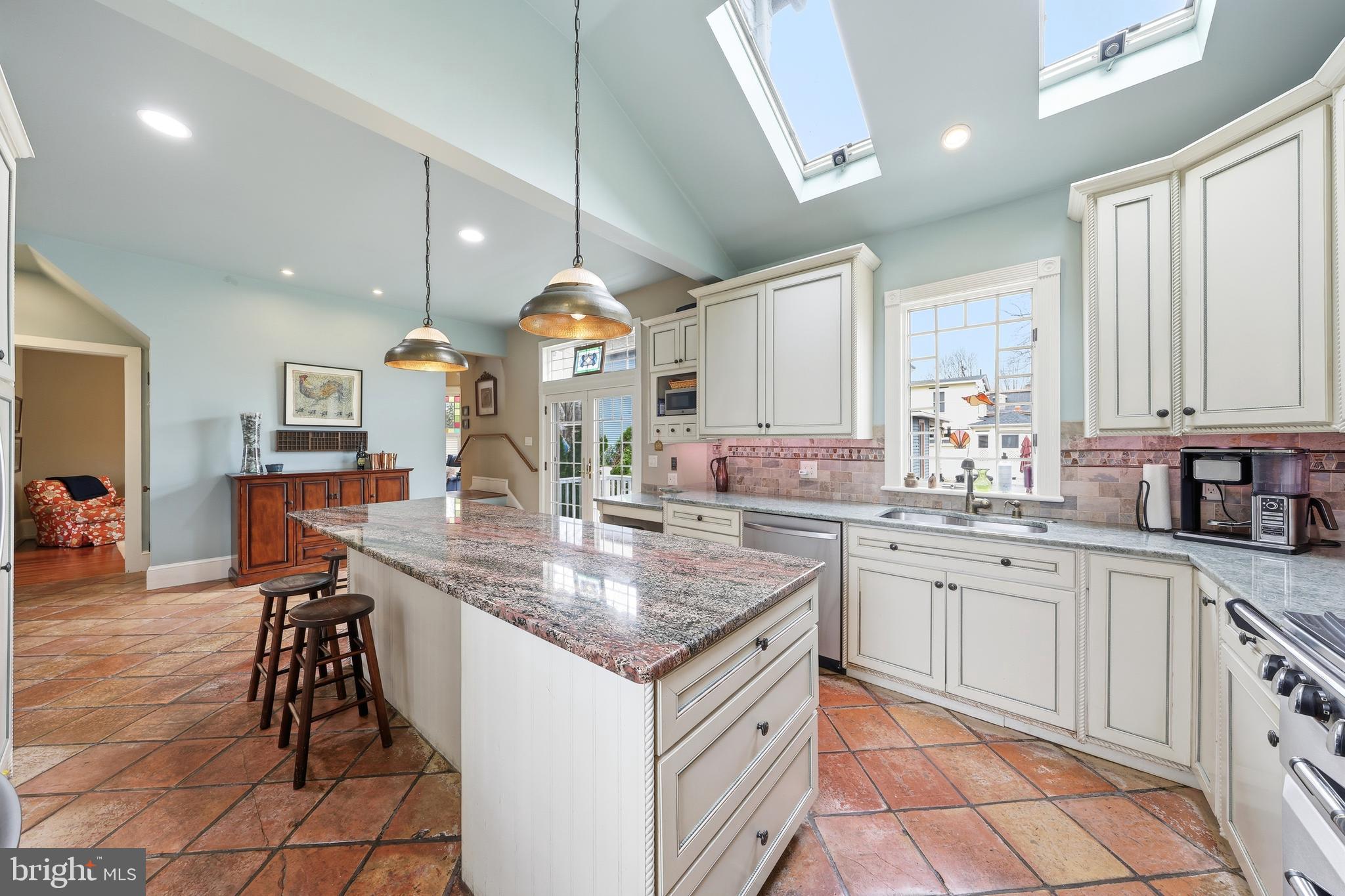 323 Washington Avenue Haddonfield, NJ 08033 - Photo 33 of 57 a kitchen with stainless steel appliances granite countertop a sink a stove and a wooden cabinets