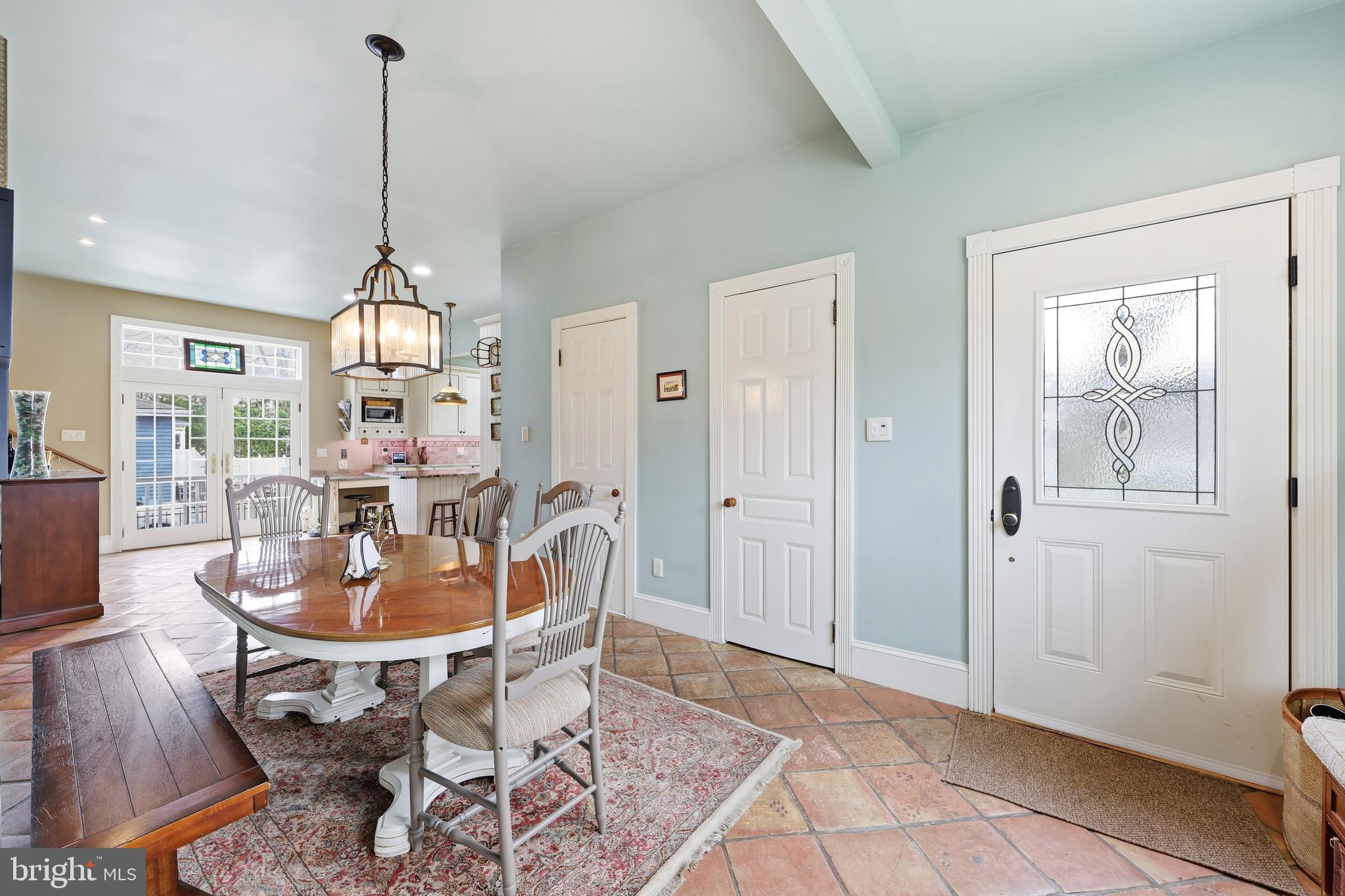 323 Washington Avenue Haddonfield, NJ 08033 - Photo 36 of 57 a dining room with furniture a chandelier and wooden floor