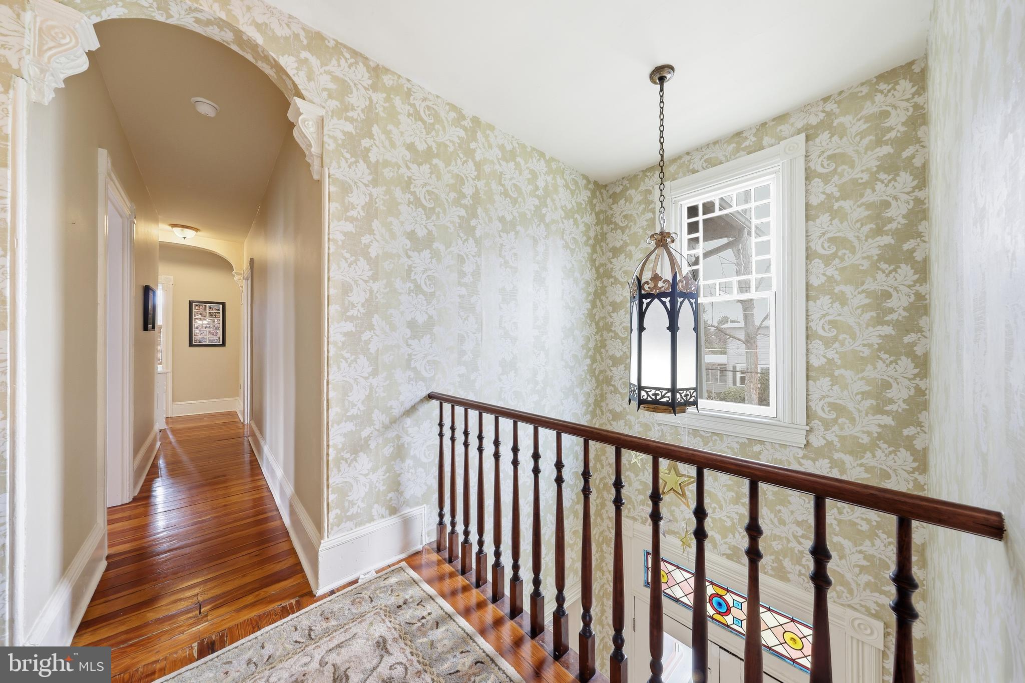 323 Washington Avenue Haddonfield, NJ 08033 - Photo 38 of 57 a view of hallway with wooden floor and a chandelier