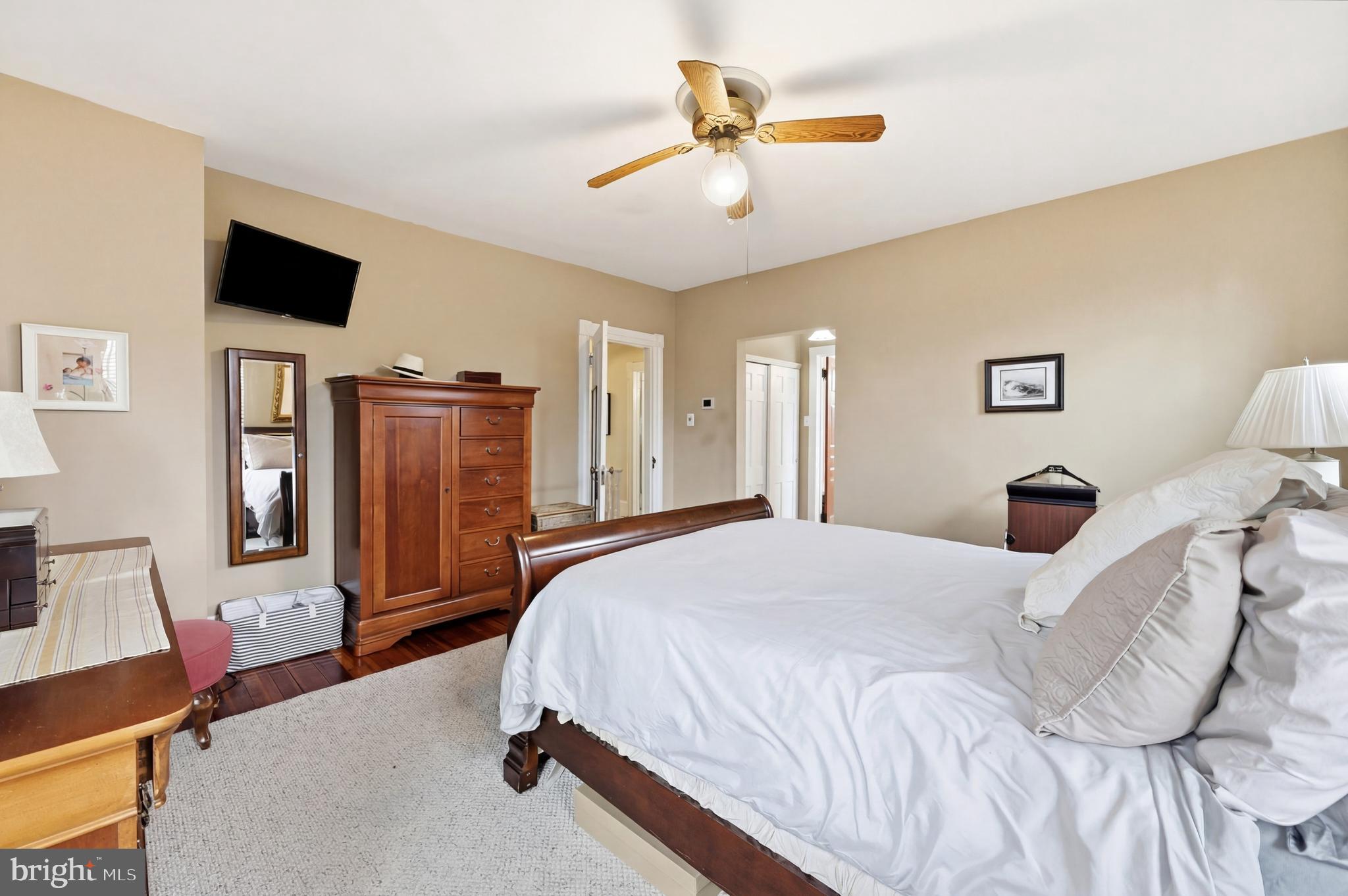 323 Washington Avenue Haddonfield, NJ 08033 - Photo 40 of 57 a bedroom with a bed and a flat screen tv