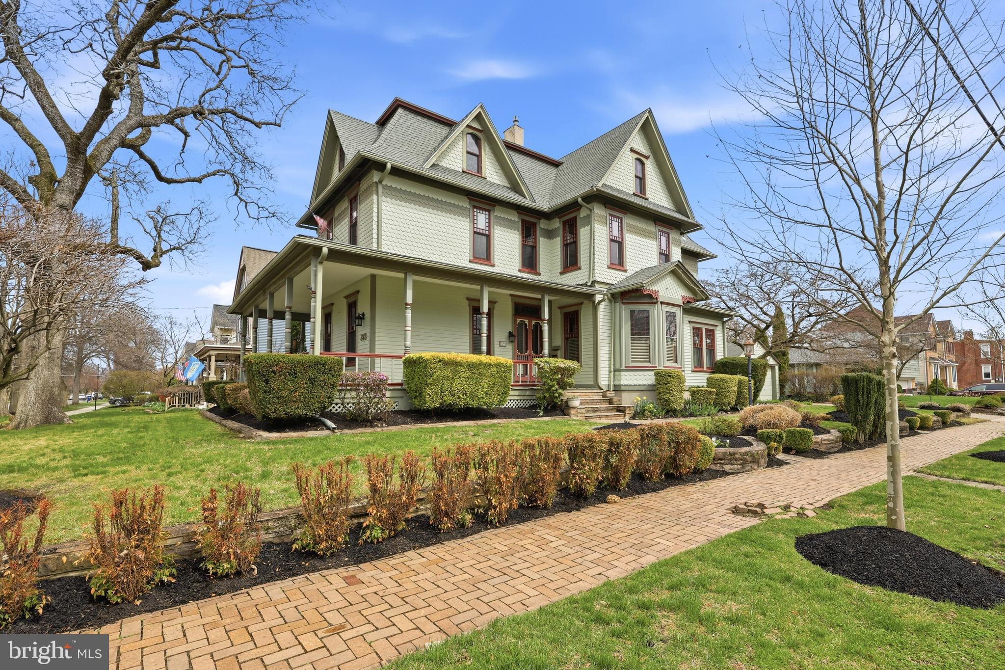 323 Washington Avenue Haddonfield, NJ 08033 - Photo 4 of 57 a front view of a house with a yard