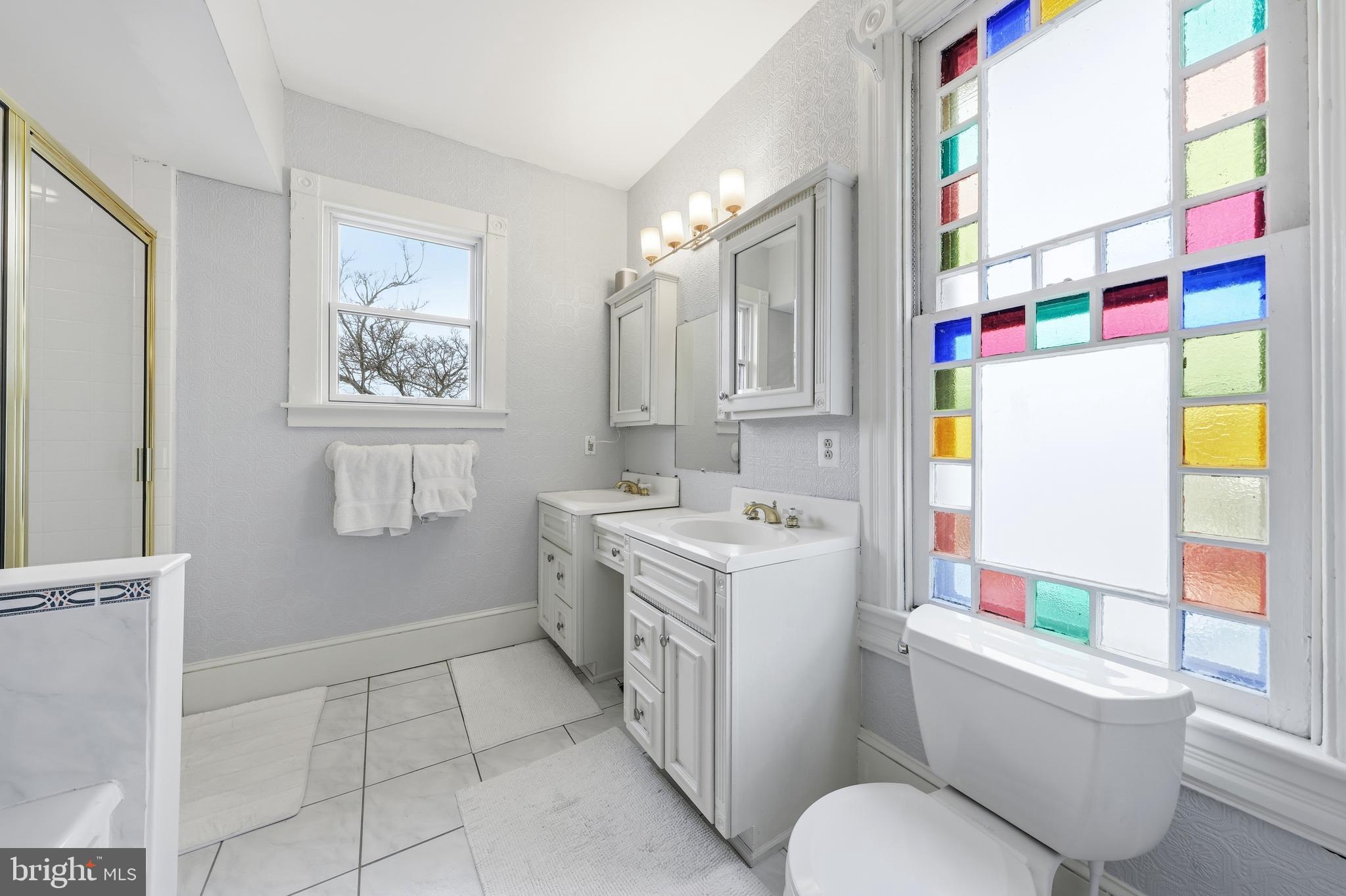 323 Washington Avenue Haddonfield, NJ 08033 - Photo 41 of 57 a bathroom with a sink toilet vanity and window