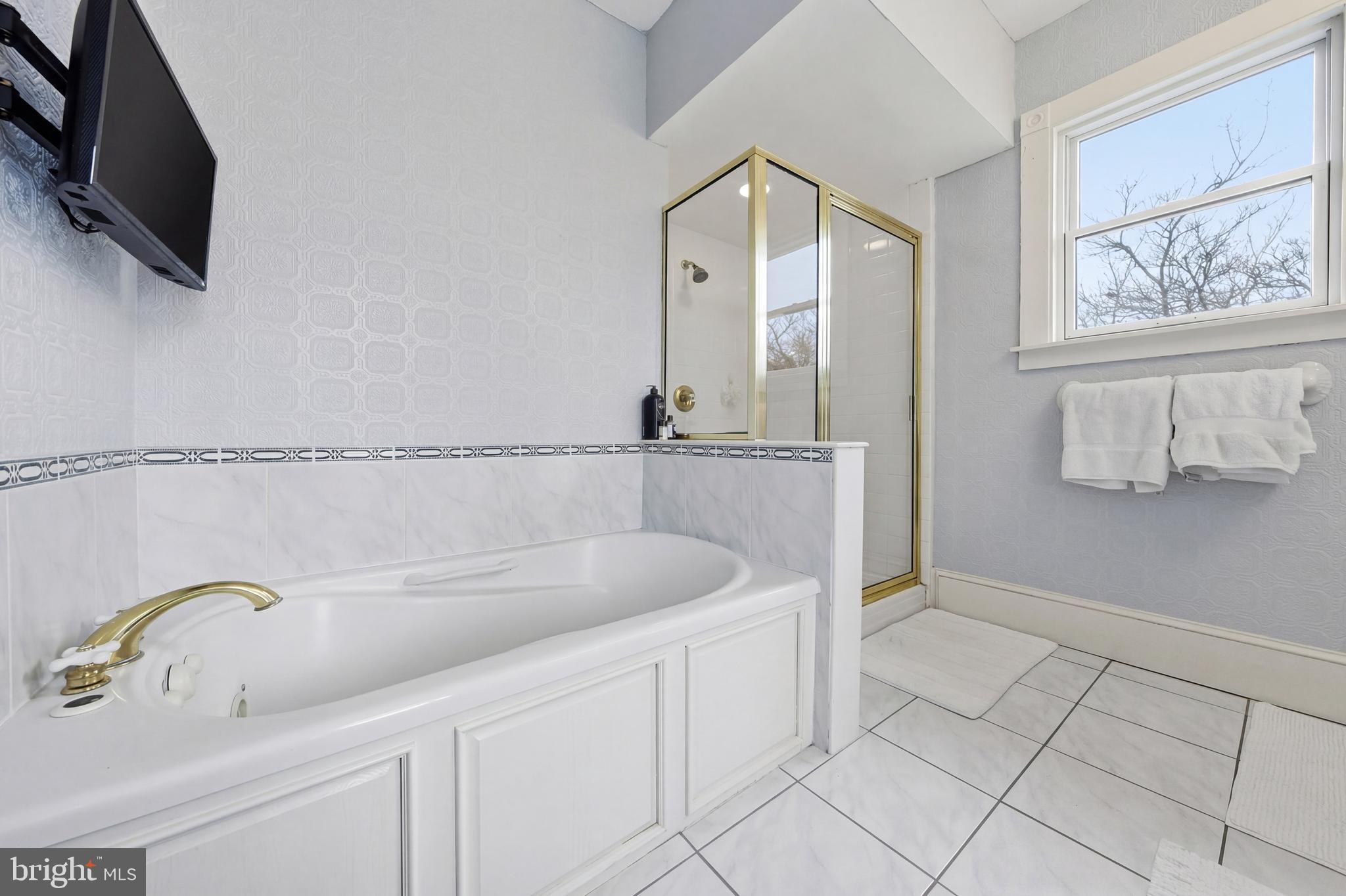 323 Washington Avenue Haddonfield, NJ 08033 - Photo 42 of 57 a bathroom with a sink and a mirror