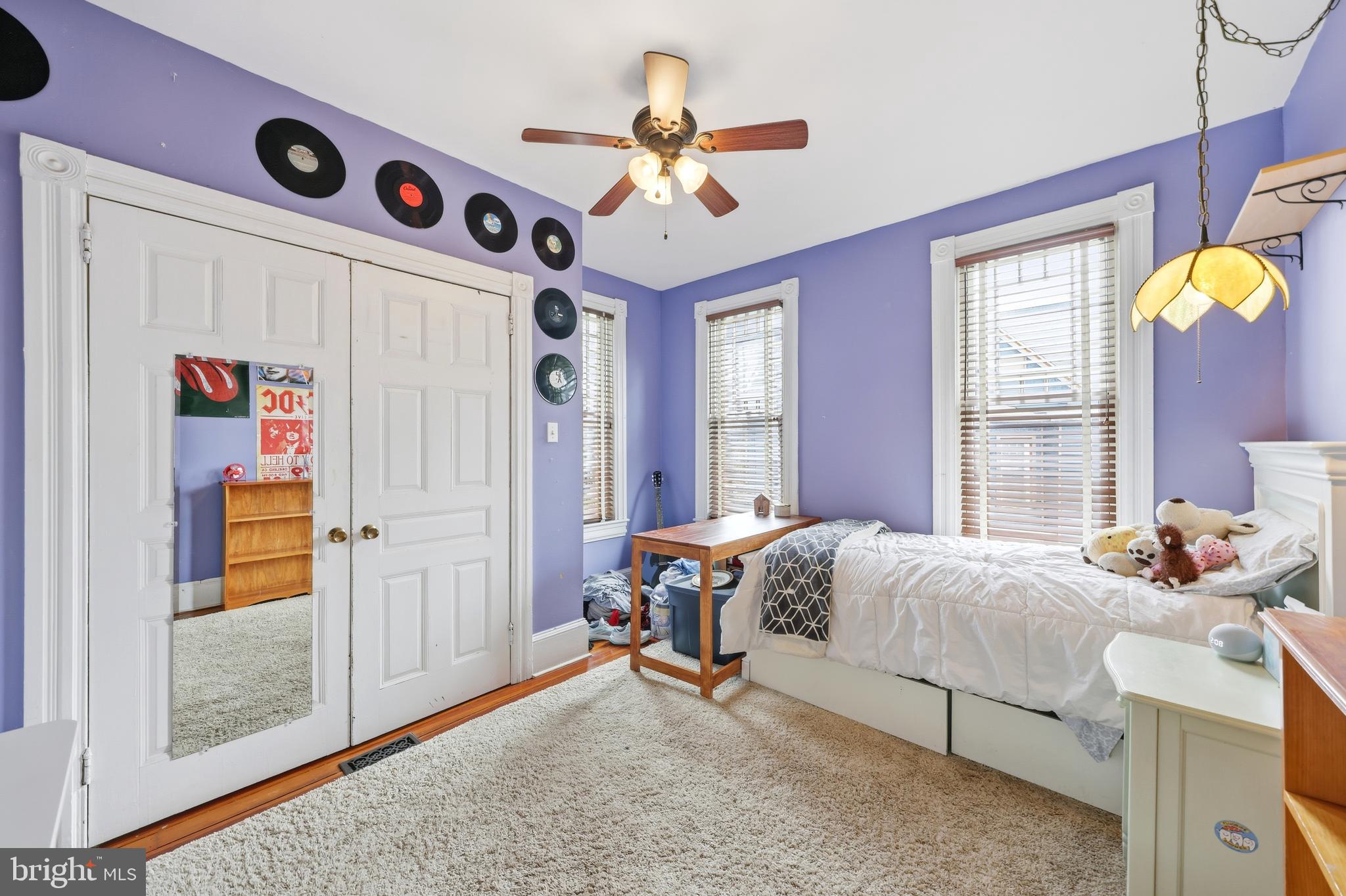 323 Washington Avenue Haddonfield, NJ 08033 - Photo 45 of 57 a bedroom with a bed and a chandelier